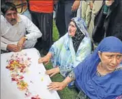  ?? AFP FILE ?? Relatives of deputy SP Mohammad Ayub Pandith mourn in Srinagar after his death on June 23.