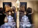  ?? ?? Crowds gather to inspect the newly verified Rembrandt on Thursday. Photograph: Koen van Weel/EPA