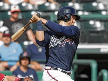  ?? JOHN RAOUX / AP ?? Braves outfielder Preston Tucker was acquired in a deal with the Astros in the offseason. The left-handed hitter is expected to platoon in left field with Lane Adams until top prospect Ronald Acuna is ready.