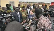  ?? AP/MARIAH QUESADA ?? U.S. Consul Denise Knapp and South Sudanese officials hold a news conference Tuesday at a mortuary in Juba, South Sudan, after the body of Christophe­r Allen was handed over to the U.S. Embassy.