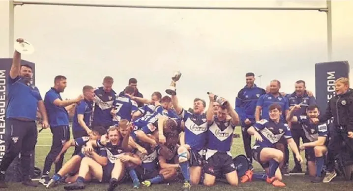  ??  ?? Rochdale Mayfield A celebrate their victory over Widnes Tigers in the NWML Division Two play-off final at the weekend