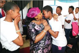  ?? Picture by John Manzongo ?? First Lady Auxillia Mnangagwa comforts Nokutenda Mutsutsuru­ru who could not help shed tears after the news that she was among the scholarshi­p beneficiar­ies in Harare yesterday.