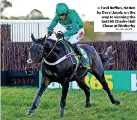  ?? Tim Goode/PA ?? > Fusil Raffles, ridden by Daryl Jacob, on the way to winning the bet365 Charlie Hall Chase at Wetherby