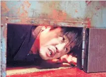  ?? Tartan Films ?? CHOI MIN-SIK appears in the 2003 film “Old Boy,” a picture of raw violence that was part of Park’s revenge movie trilogy.