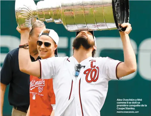  ?? PHOTO D’ARCHIVES, AFP ?? Alex Ovechkin a fêté comme il se doit sa première conquête de la Coupe Stanley.