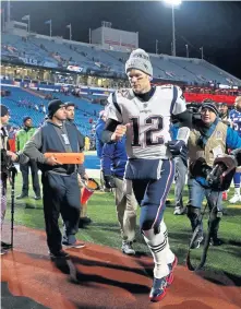  ?? NANCY LANE / BOSTON HERALD ?? READY TO PLAY: Tom Brady is expected to be on the field for Sunday’s game between the Patriots and New Jork Jets in the Meadowland­s.