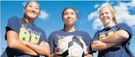  ?? ALGERINA PERNA/BALTIMORE SUN ?? River Hill tri-captains, from left, Megan Chun, Victoria Tran and Carly Wetzel have helped the Hawks win five straight games.