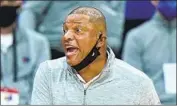  ?? Matt Slocum Associated Press ?? DOC RIVERS became coach of talented Philadelph­ia just days after parting ways with the Clippers.