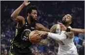  ?? KARL MONDON – BAY AREA NEWS GROUP ?? Lakers guard D'Angelo Russell, right, injured his right ankle in a victory over Golden State on Thursday.