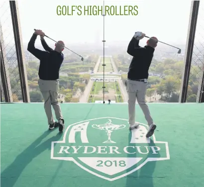  ?? Picture: Getty Images ?? United States Ryder Cup captain Jim Furyk (left) and European counterpar­t Thomas Bjorn tee off from a platform on the Eiffel Tower during an exhibition event for next year’s match in Paris.