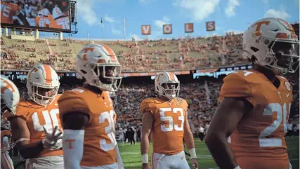  ?? CALVIN MATTHEIS/NEWS SENTINEL ?? Tennessee players warm up before the team’s 2022 home opener against Ball State. This season’s Neyland Stadium debut takes place at 5 p.m. Sept. 9 when Austin Peay visits Knoxville to take on the top-10 Vols.