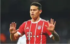  ?? AFP ?? Bayern Munich’s James Rodriguez is subdued after scoring during the second-leg against Real Madrid.