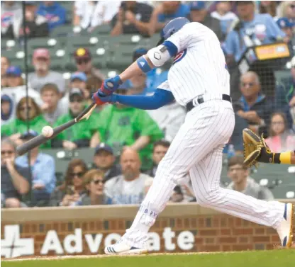  ?? MATTMARTON/ AP ?? Third baseman Kris Bryant ( 0- for- 4, two strikeouts) breaks his bat while grounding out in the first inning Sunday.