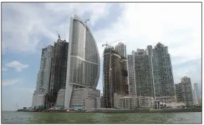  ?? AP ?? The sail-shaped Trump Ocean Club Internatio­nal Hotel and Tower stands in Panama City in this 2011 photo. The hotel’s owners’ associatio­n wants to install a new manager and kick out Trump Hotels, which it has accused of mismanagem­ent and financial...