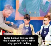  ??  ?? Judge Gordon Ramsay helps the MasterChef Juniors when things get a little fiery.