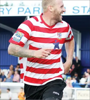  ?? PICTURE: Tony Fowles ?? LOOK BACK IN DELIGHT: Ks goalscorer Lewis Taylor sets off in celebratio­n
