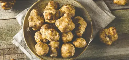  ?? GETTY IMAGES ?? Jerusalem artichokes can be sautéed in butter for a wonderful treat.