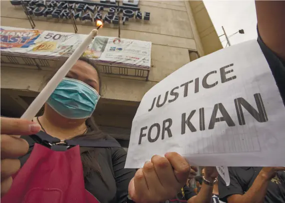  ?? SUNSTAR FOTO / ALAN TANGCAWAN ?? PUBLIC OUTRAGE. The death of 17-year-old Kian Delos Santos in the hands of Caloocan police during an anti-drugs operation last week sparked public outrage after a security camera caught police dragging the boy's body a few minutes before he was shot....