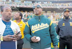  ?? NHAT V. MEYER/ STAFF ARCHIVES ?? Rapper MC Hammer waits to throw out the first pitch before an Oakland Athletics game at the Coliseum in 2019.