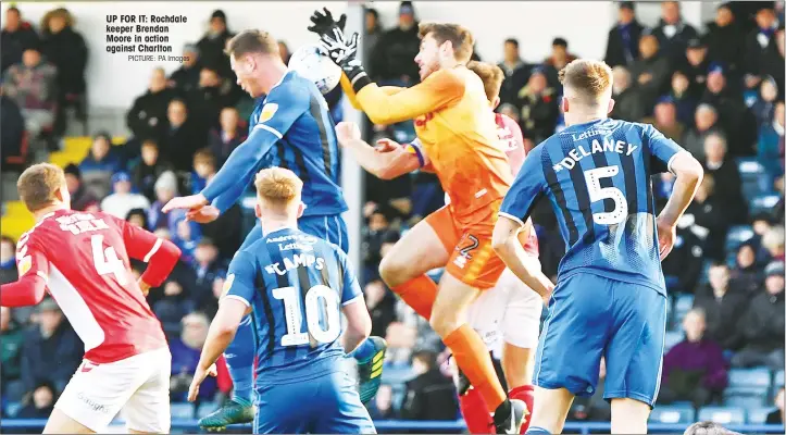  ?? PICTURE: PA Images ?? UP FOR IT: Rochdale keeper Brendan Moore in action against Charlton