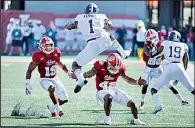  ?? AP/The Herald-Times/CHRIS HOWELL ?? Running back L.A. Ramsby (1) and the Georgia Southern Eagles rank third to last in the nation in both total offense and scoring offense.