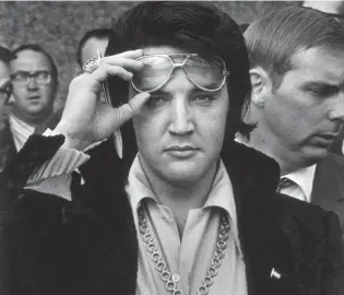  ?? DAVE DARNELL/THE COMMERCIAL APPEAL ?? Jan. 16, 1971: Elvis Presley looks into the camera after attending a luncheon at what was then the Holiday Inn Rivermont. Elvis would have turned 88 on Jan. 8 this year.