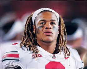  ?? File photo/AP ?? Coaches and teammates say Ohio State defensive end Chase Young is excited to get back to playing after being sideline by the NCAA for the last two games.