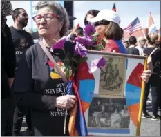  ?? DAVID CRANE/LOS ANGELES DAILY NEWS VIA AP ?? Thousands attend a march in Hollywood on Tuesday, to commemorat­e the 103rd anniversar­y of the Armenian Genocide.