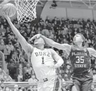  ?? GERRY BROOME/AP ?? Duke guard Trevor Keels shoots past Florida State guard Matthew Cleveland Saturday in Durham, N.C.