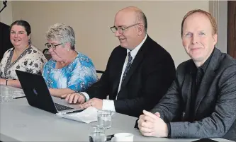  ?? MARY RILEY KAWARTHA LAKES THIS WEEK ?? Four plaintiffs from Lindsay have filed a class action lawsuit against the Ontario government in the wake of its cancellati­on of the basic income pilot program last month. Lindsay Advocate publisher Roderick Benns, right, announced the suit at the Day’s Inn in Lindsay on Monday. From left are plaintiffs Tracey Mechefske and Dana Bowman, along with Mike Perry, the lawyer who is representi­ng them pro bono. Two other plaintiffs, Susan LIndsay and Grace Marie Doyle Hillion, were unable to attend.