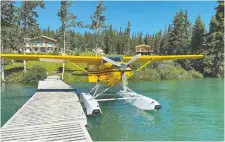  ?? GREG OLSEN ?? You can have a float plane pick you up right at the docks at Southern Lakes Resort in Tagish, Yukon.