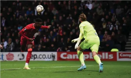  ?? ?? Divock Origi backheels a volley over Declan Rudd to seal the win. Photograph: Nick Taylor/Liverpool FC/Getty Images