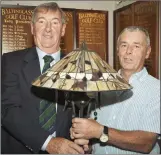  ??  ?? Prize winner Paul Davis with Baltinglas­s Golf Club captain John Kelly.