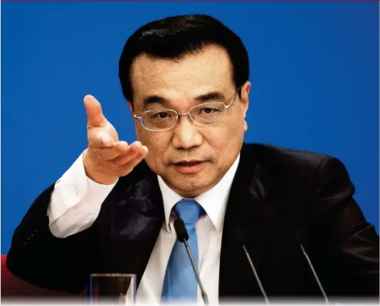  ?? AFP Photo: ?? Chinese Premier Li Keqiang speaks during a press conference after the closing ceremony of the annual session of China’s legislatur­e, the National People’s Congress, in Beijing on Wednesday. Premier Li warned the US against starting a trade war while...