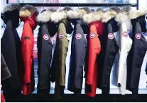  ?? CHRISTINNE MUSCHI/BLOOMBERG ?? Not long after Canada Goose parkas became a winter fashion hit, cheaper knockoffs started to appear.