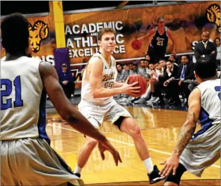  ?? ANNE NEBORAK — DIGITAL FIRST MEDIA ?? West Chester guard Matt Penecale looks to break down the Cheyney defense in the first half against Cheyney on Saturday.