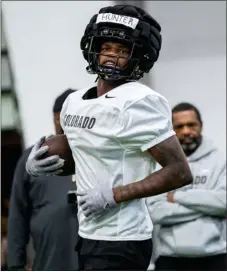  ?? DEREK MARCKEL, UNIVERSITY OF COLORADO ?? Colorado cornerback/receiver Travis Hunter works during Sunday’s practice in Boulder.