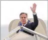  ?? PHOTO: REUTERS ?? US Secretary of State Antony Blinken waves upon his arrival in Shanghai yesterday.