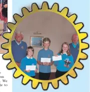  ??  ?? Iain MacIntyre and Ken Moncrieff presenting certificat­es for public speaking to winner Megan Day, second placed Murray Scott and third Sophie Houston.