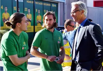  ??  ?? David Gallop (right) talks to national team players Josh Brillante (centre) and Jackson Irvine during a media call in Sydney. — AFP photo