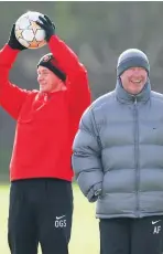  ??  ?? Ole Gunnar Solskjaer and Sir Alex Ferguson in 2003