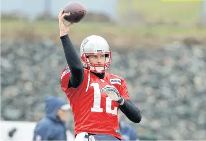  ??  ?? Patriots quarterbac­k Tom Brady passes the ball during a practice session on Thursday.