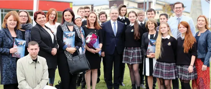  ??  ?? Russian visitors meet members of the St Oliver’s community.