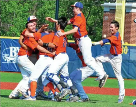  ?? KYLE MENNIG – ONEIDA DAILY DISPATCH ?? Oneida players celebrate after beating Skaneatele­s in the Section III Class B final in Syracuse on Monday,.