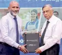  ?? ?? Naleen Edirisingh­e, CEO of Pan Asia Bank, and Prof. Lakshman R. Watawala, Founder & President of CPM Sri Lanka are seen exchanging Mous