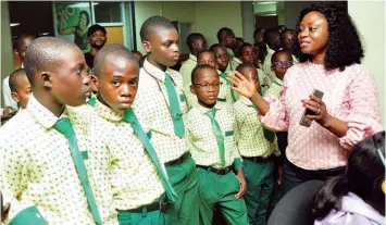  ??  ?? Manager, Prepaid Call Centre, Globacom, Abimbola Umozurike (right), enlighteni­ng students of At-tanzeel Secondary School, Ikorodu, Lagos, during their excursion to Globacom head office in Lagos.