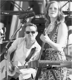  ?? Jason Franson/ Edmonton Journal files ?? Melissa McClelland and Luke Doucet of Whitehorse onstage at the Interstell­ar Rodeo in Hawrelak Park in July 2012.
