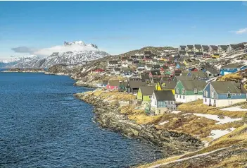  ?? Picture: 123rf.com/maestroo ?? CHANGING Small coloured houses in Nuuk, Greenland, in 2014.