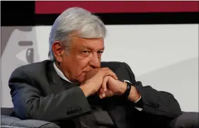  ??  ?? Mexican President-elect Andres Manuel Lopez Obrador listens during a meeting with Ricardo Salinas and other business leaders in Mexico City, Nov. 22. AP PhoTo/rEbEccA bLAckwEL