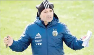  ?? GABRIEL BOUYS/AFP ?? Argentina coach Jorge Sampaoli takes training in Madrid on Sunday ahead of their friendly with Spain on Tuesday.